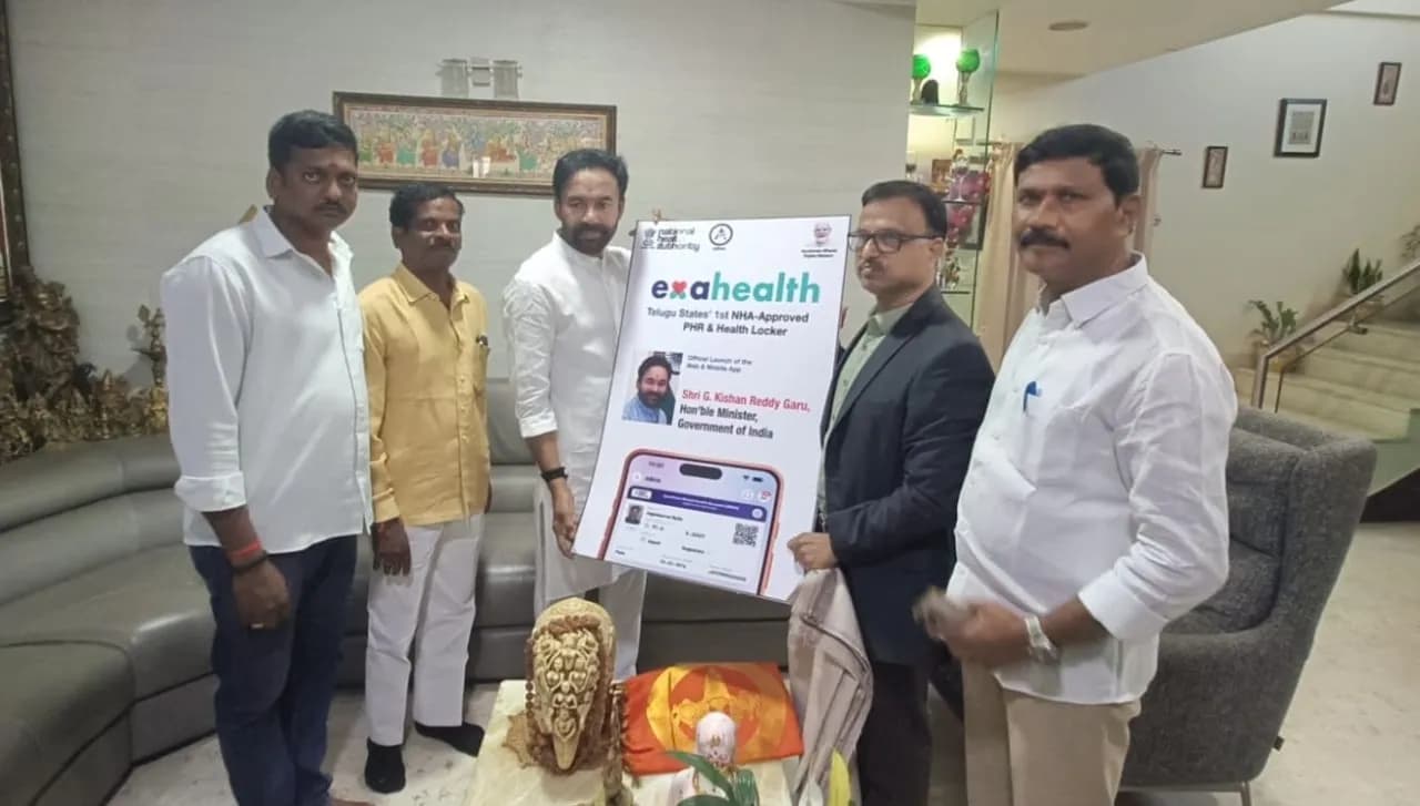Shri G. Kishan Reddy with four other attendees holding the ExaHealth launch poster at the web and mobile app launch in Hyderabad.